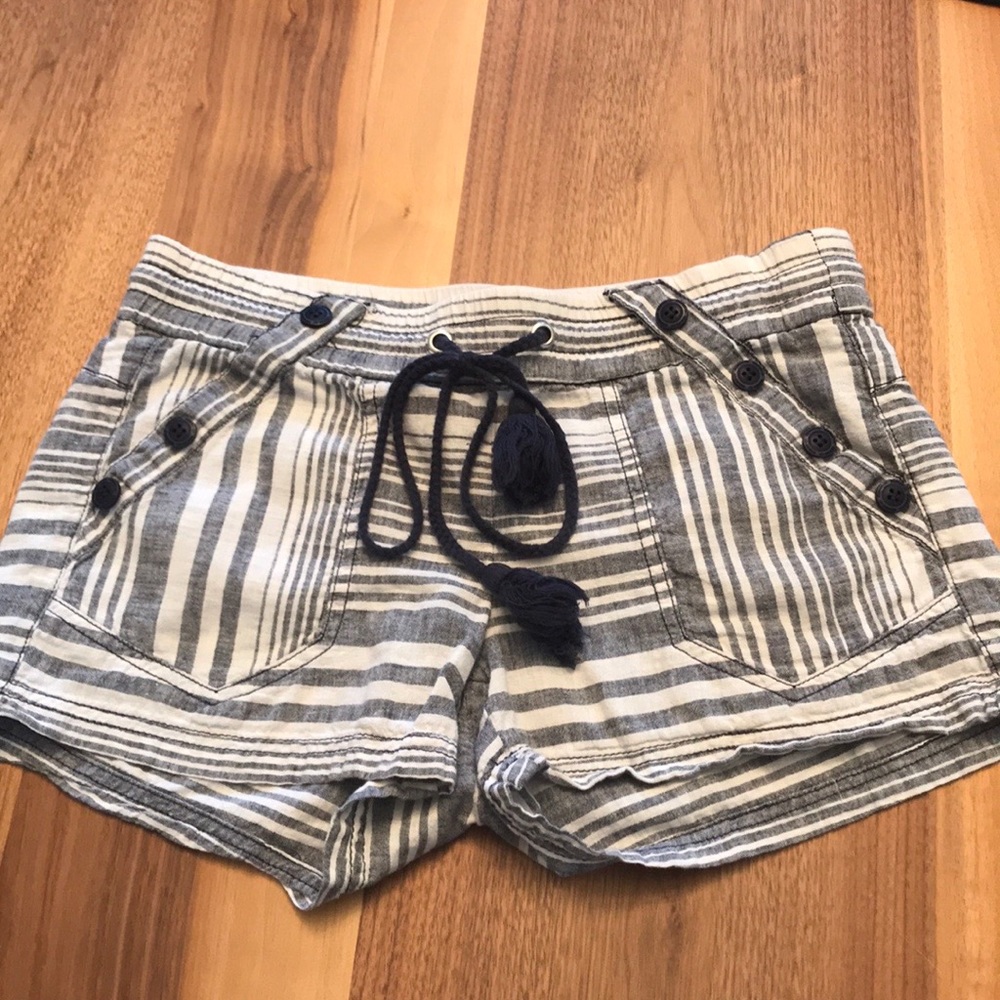 NWOT Rewind. Size XS Strips for style and design.